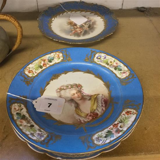 A Sevres outside decorated plate and two Sevres style plates, late 19th / early 20th century, 14 - 23.5cm